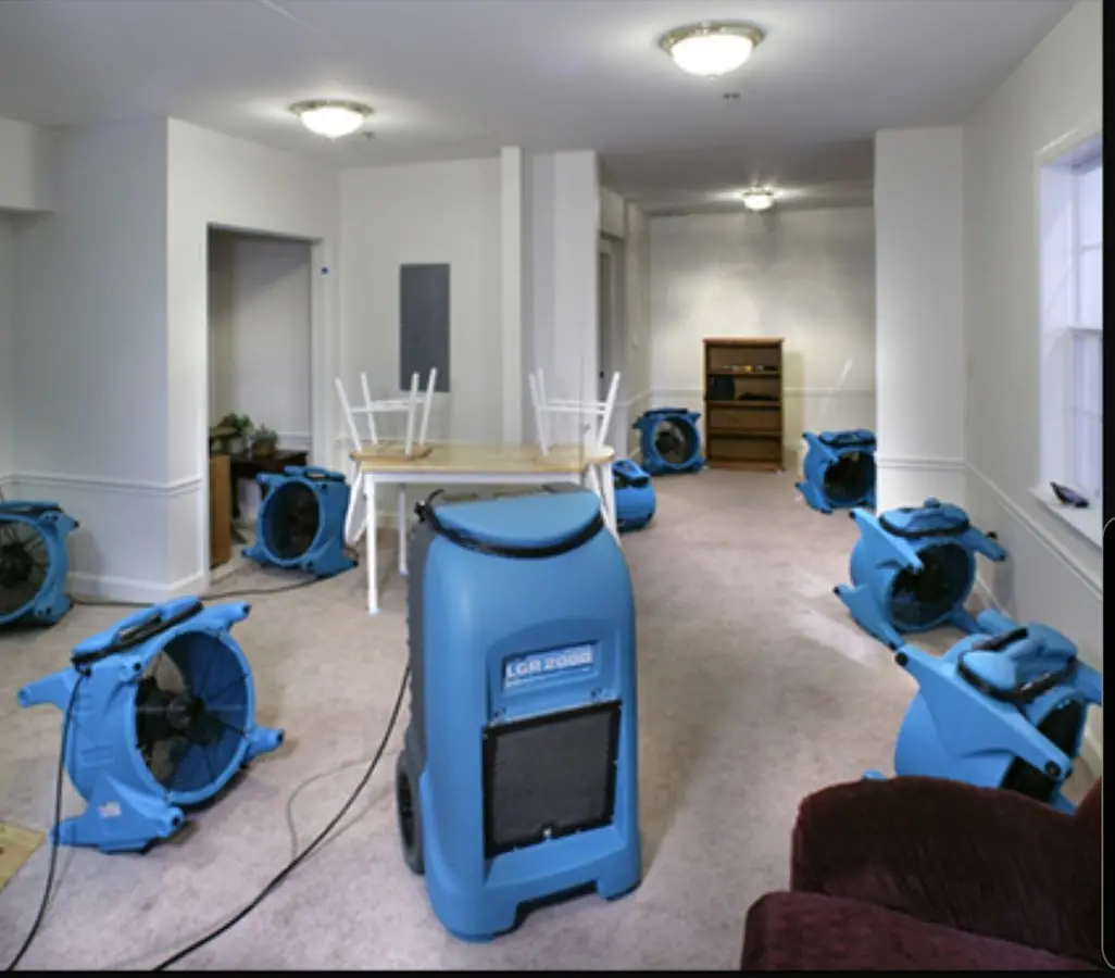 Air movers and dehumidifier setup for Water Damage Restoration in Riverdale Park